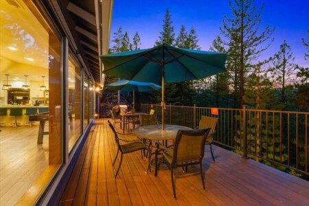 A luxury log cabin deck overlooking the Great Smoky Mountains, perfect for those looking to book direct cabin rentals Gatlinburg