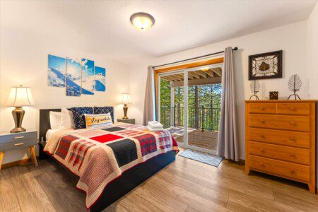 Beautifully styled master bedroom in a private chalet, an ideal choice when deciding where to stay in Lake Tahoe for couples